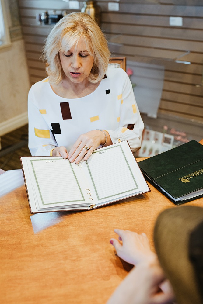 woman holding book open